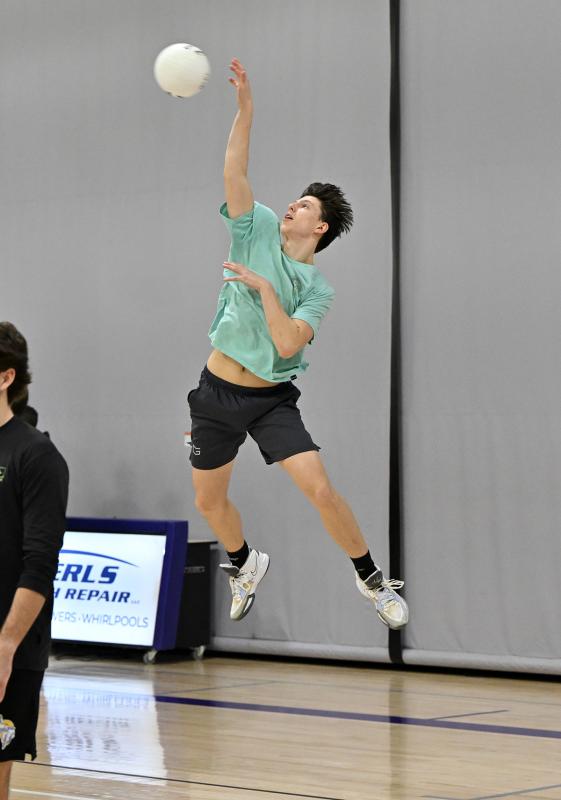 Ryder Van Horn serves a winner for the Vikings.