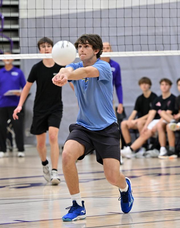 Jason Harpel Rickards bumps a dig.