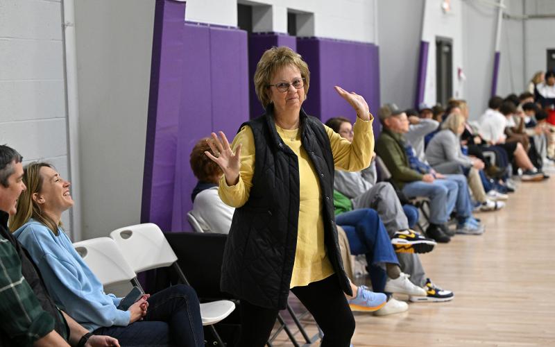 Cape junior Lawson Whaley’s grandmother, Pat, does a celebratory dance after a winning point.