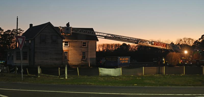 Firefighters from Lewes train at the corner of Cave Neck Road and Route 1.