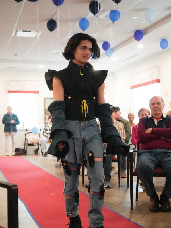 Benjj Chau models the avant-garde denim look he designed.