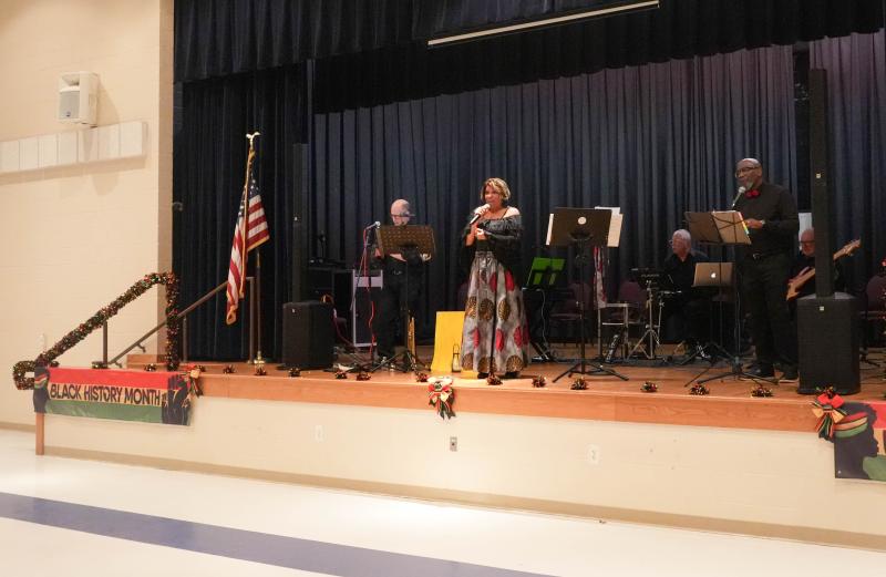 Positively Toni Marie sings at the CHEER event.