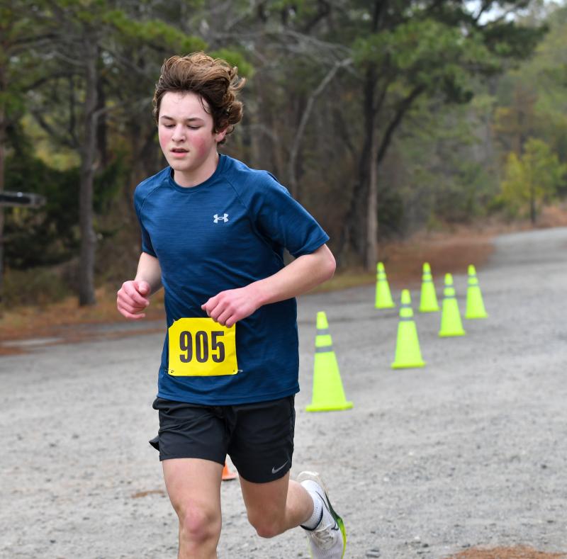 Quade Cummings wins the 5K in 20:56.