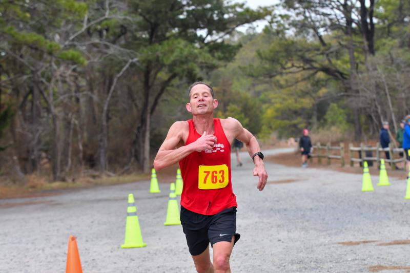 Mike Sewell wins the male master 10-miler in 1:10:12.