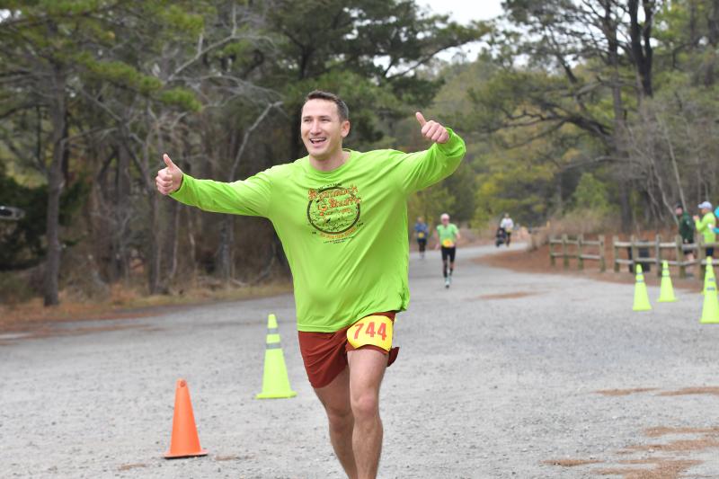Sergiu Rerpesco celebrates his time of 1:23:46.