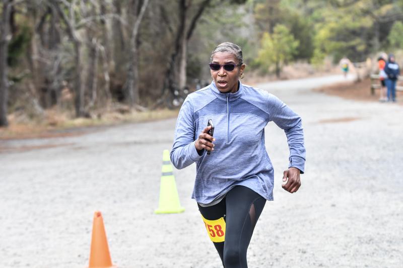 Robbin Wells eyes the finish line, recording a time of 1:55:31.