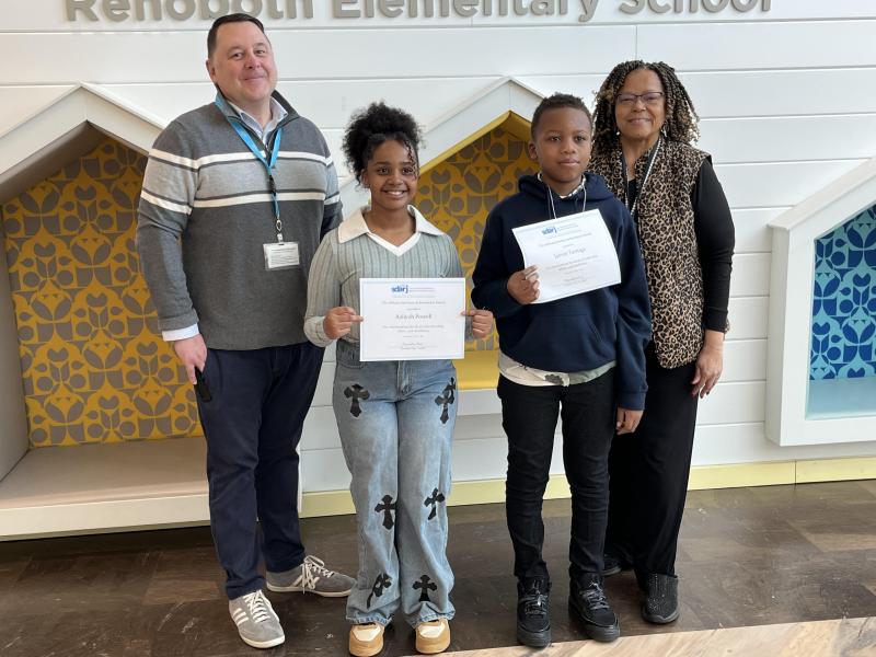 Gathered for the Southern Delaware Alliance for Racial Justice academic achievement award presentation are (l-r) Rehoboth Elementary School Assistant Principal Kevin Monaghan, recipients Aaliyah Powell and Javion Turnage, and Principal Doris Person. SUBMITTED PHOTO