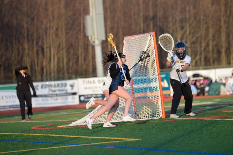 Claire Lopez rolls the crease.