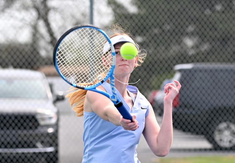 Cape second-singles player Kathryn Costello hits a forehand as she dropped a match to Ava Vu.