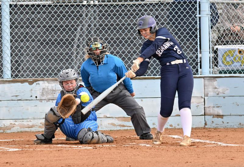 Seahawks’ sophomore Caroline White drives a hit.
