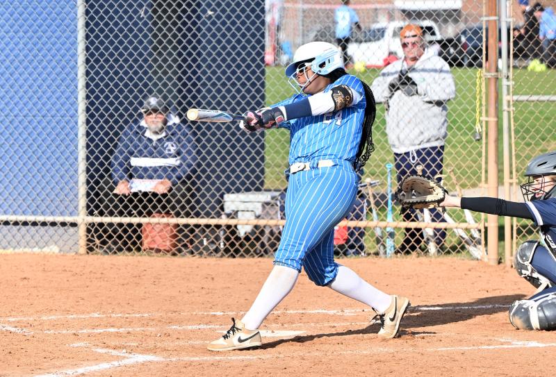 Freshman Jordynn Bowe slams a hit for the Vikings.