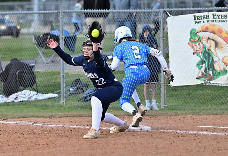 Cape’s Eden Frederick beats the throw to first baseman Caroline White.