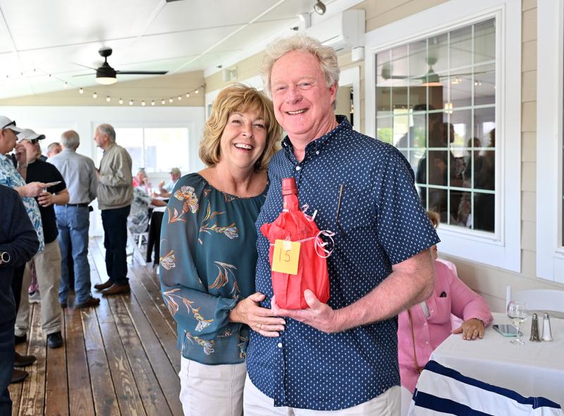Lisa Durant and Charlie Joseph show off their hidden bottle of joy.