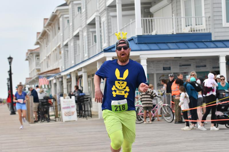 Mark Johnson, 36, of Palmyra, Pa., finishes the 5K in 21:26.
