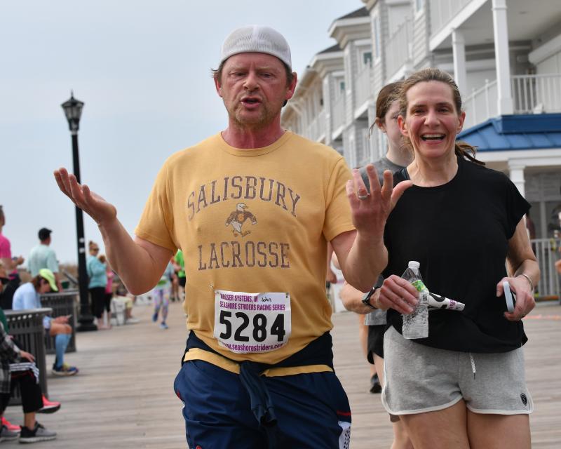 John Boshart, 53, ran 33:52.