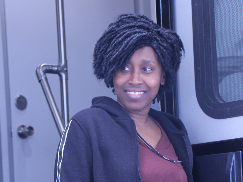 Bernadette Louiser exits the Bayhealth mobile clinic April 16. A screening by medical staff visiting her workplace at Perdue in Milford detected indications of potential future breast cancer, allowing Louiser to begin regular checkups to help prevent illness in later years. KEVIN T. CONLON PHOTO
