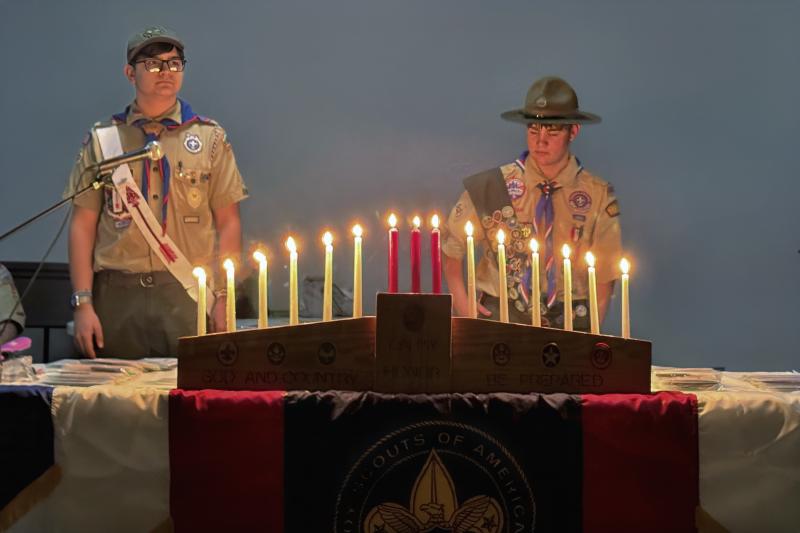 Troop 1 scouts Luke Wisner, left, and Ian Campbell take part in leading the Court of Honor ceremony. SUBMITTED PHOTOS