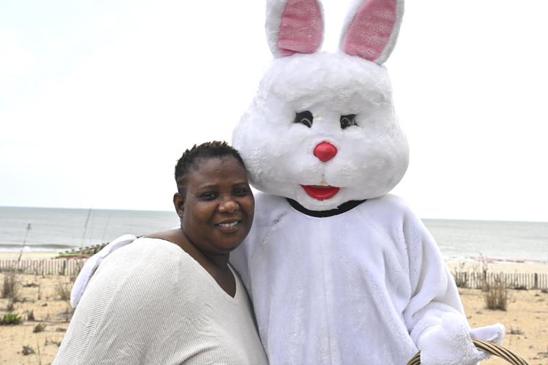 Ado Samounegah takes a moment from her day to hang out with the Easter Bunny.