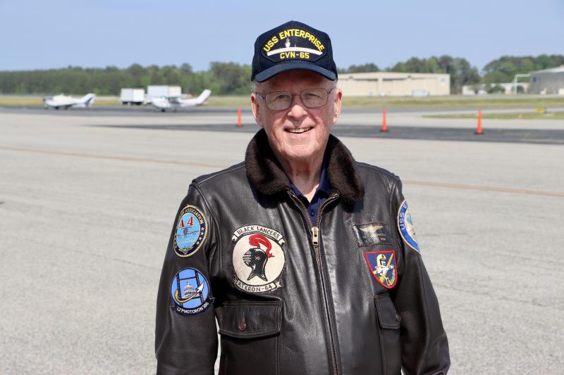 Jim O’Donnell at Delaware Coastal Airport wearing a flight jacket with patches from some of the Navy squadrons he flew with. O’Donnell, 88, still flies around Sussex County. BILL SHULL PHOTO