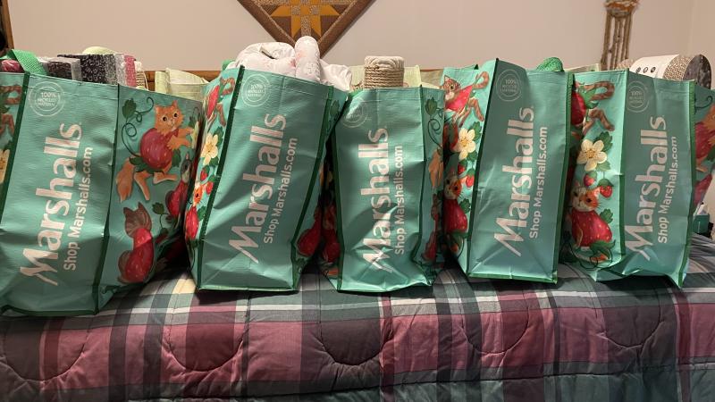 The cat-related items donated by Marshalls employees in April will be included in gift baskets and bags for raffle in October.