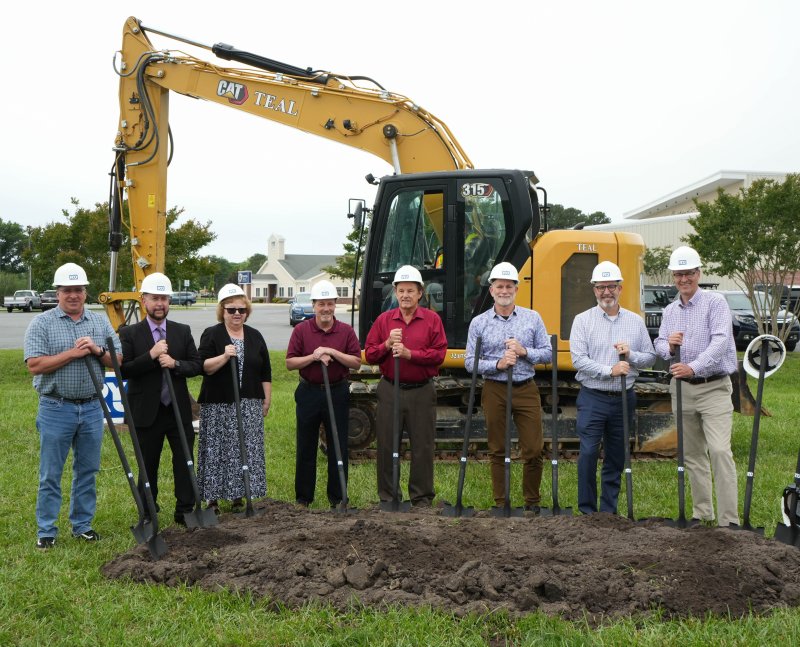 Members of the Delmarva Christian Board of Directors hold shovels at the ceremony May 27. Shown are (l-r) Donnie Burris, Craig Moyer, Marlene Brown, Jay Stevens, Lynn Moore, Dan Schlabach, Chris Theis and Garry Light.