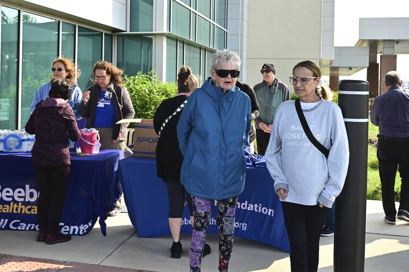 The crowd appeared larger this year and eager to get started on their walk. TED PFIRRMANN PHOTO