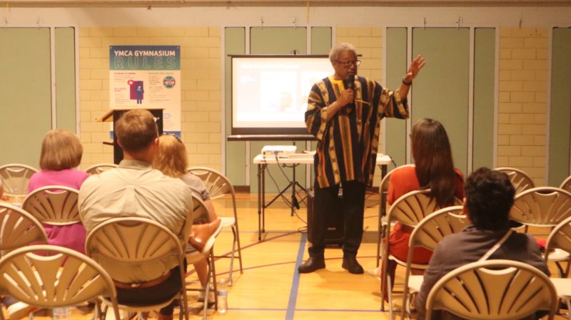 Joe Lawson engages with his audience during his community presentation.