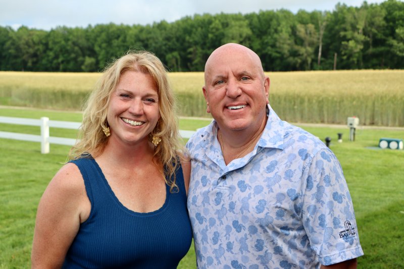 Leigh McKinley, director of HAP’s Sussex County pet adoption center, left, and Tom Protack, who consults with local nonprofits, take a minute for a photo at the event.