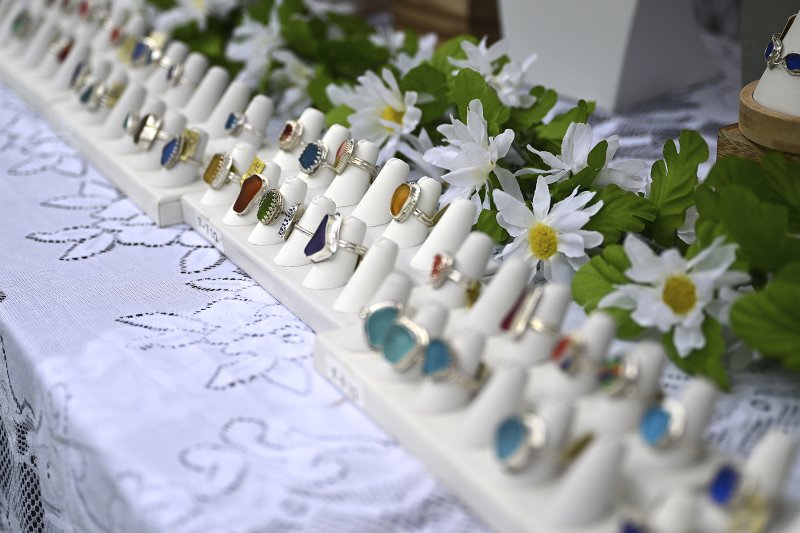 Bejeweled with sea glass stones, rings beckon visitors to Prime Hook Beach Studio’s stand. TED PFIRRMANN PHOTOS