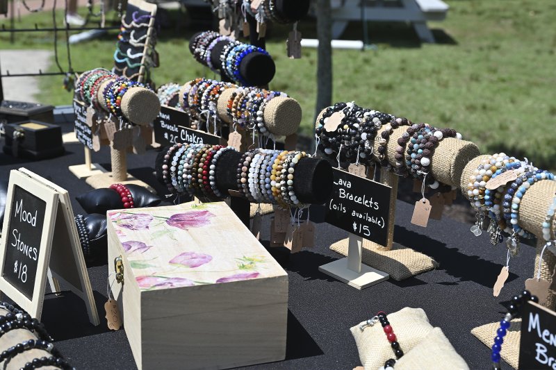 Eve Marie Tyrrell sells jewelry at the event.