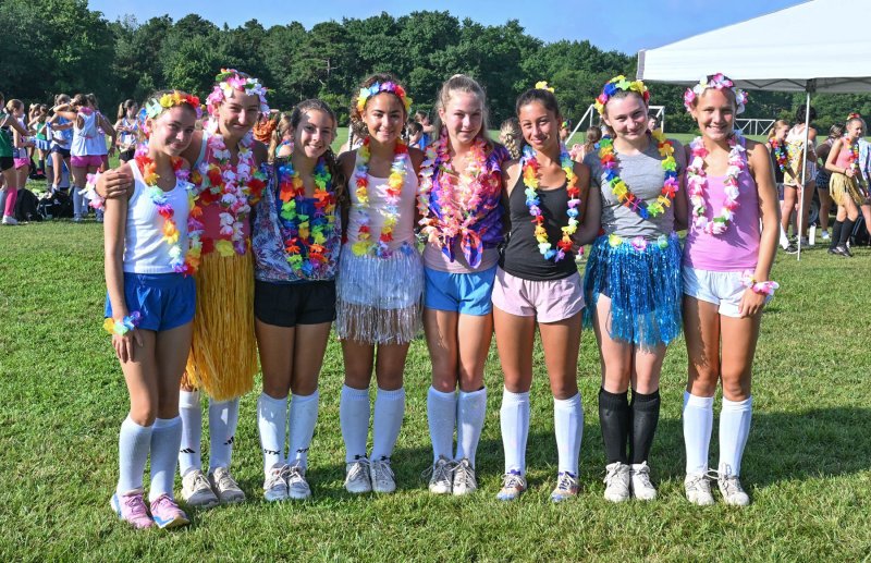 Dressed for luau day at the camp are (l-r) Kylie Elliott, Alex Gumnel, Amelia Leggette, Taylor Elshani, Allie Thompson, Eloise DeCarlo, Zoe Schmidt and Meghan Kelly.