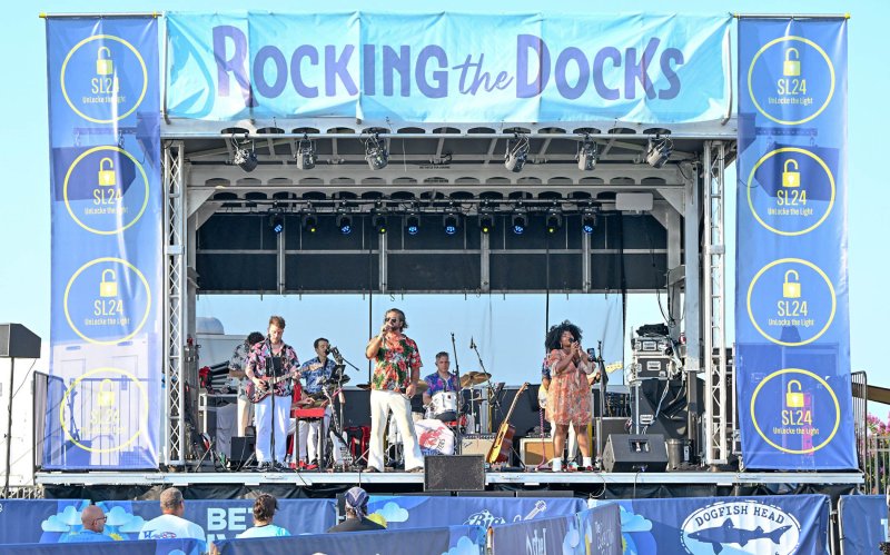 The Yacht Lobsters entertain the crowd with their covers from Elton John and Kiki Dee to Wham. DAN COOK PHOTOS