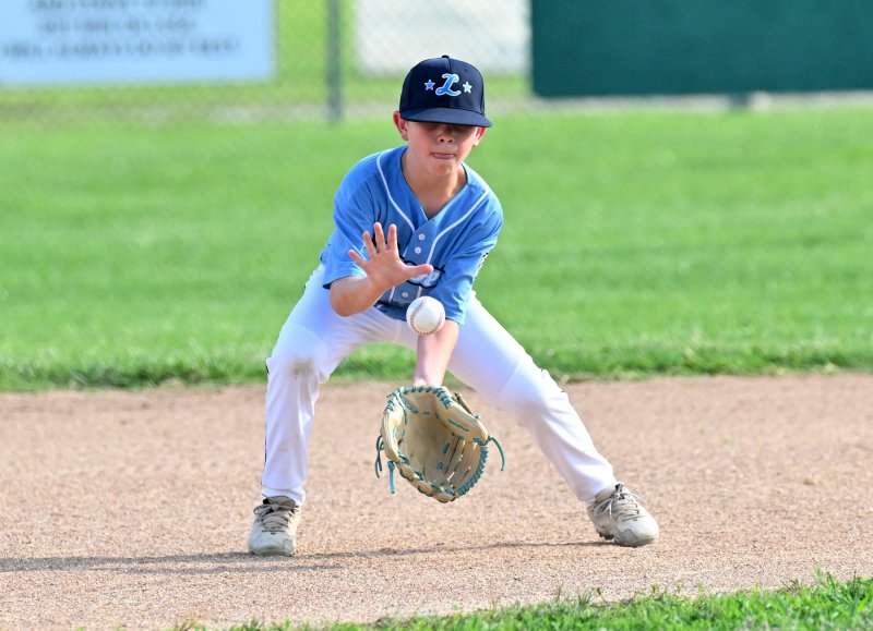 Lewes shortstop Joey Petito snags a hot Georgetown grounder.