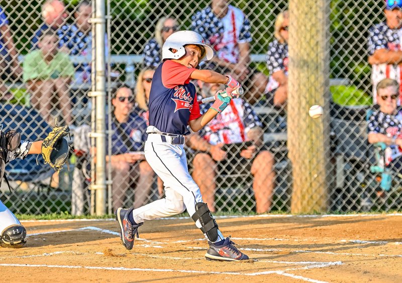 MOT shortstop Roman Ficarra hits into a fielders choice.