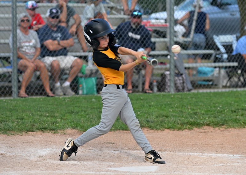 Weston Wharton knocks one into the outfield for Georgetown.