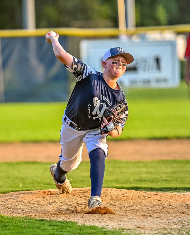 Milton starting pitcher Krew Johnson delivers a fastball.