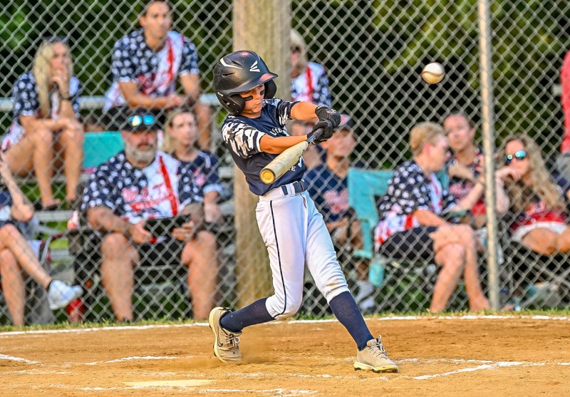 Milton all-star Henry Hill drives one of his two hits in the 5-1 win over MOT. DAN COOK PHOTOS