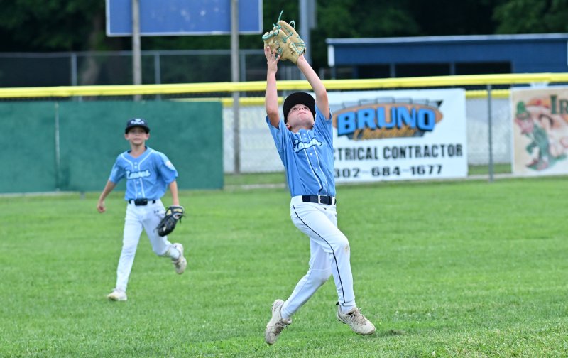 Lewes shortstop Joey Petito shows his range on a fly ball.