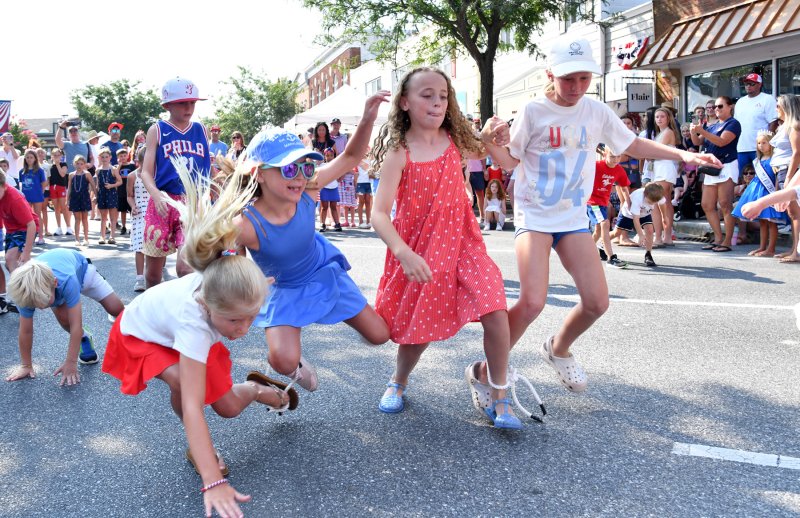 Bessie Alleman, left, and her partner Mirabel Jordan take a spill but manage to hold off the charge of Fione Dunne and Claire Brittingham.