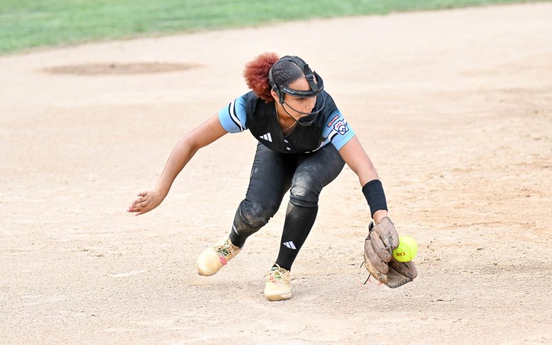 Delaware shortstop Kimora Harris snags a hot grounder.