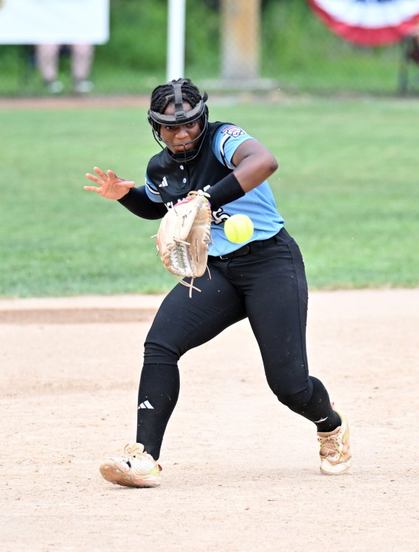 Cierra Lewis snags a hot bouncer at second base.