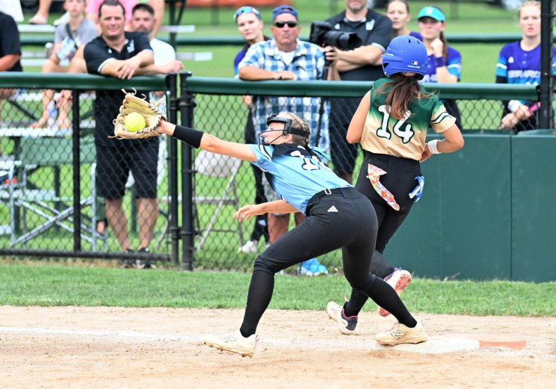 Karly Kruger makes a close play at first.