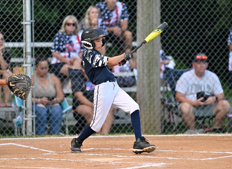 Milton’s Jaxon Kulp slams a hit.