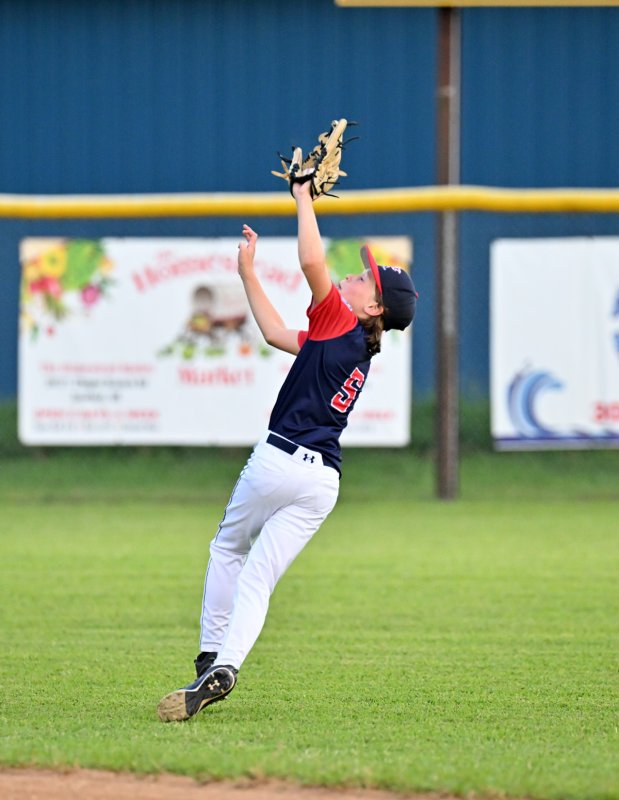 MOT’s Ethan Ertle makes a highlight-reel catch over the shoulder to rob Milton of a hit.