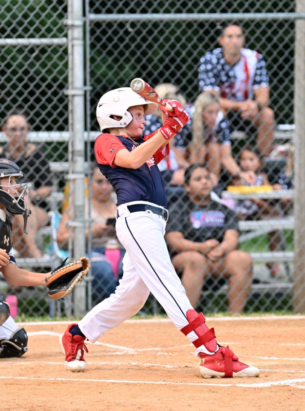 MOT’s Christian Lindner slams a double.