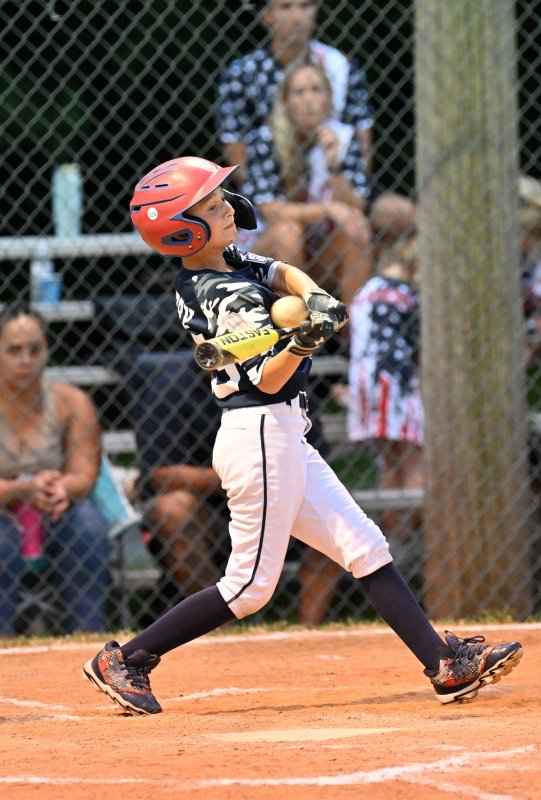 Milton’s Hudson Libby slams a hit.