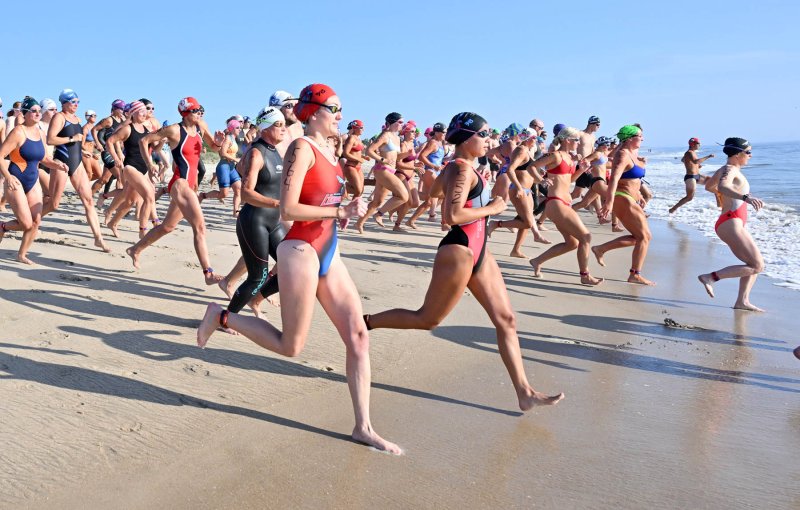 The open female division and team competitors take off at the start.