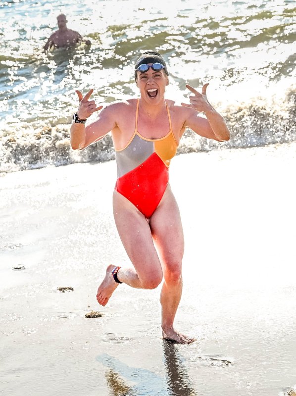 Elle Keck of Palmyra, Pa., sprints from the surf.