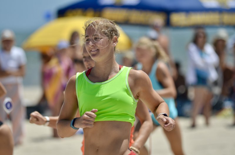 Rehoboth Beach Patrol’s Sophia Gulotti smiles after qualifying for the 2024 finals in the women’s open 90-meter sprint. AARON MUSHRUSH PHOTO