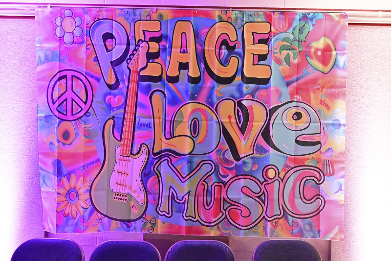Peace, Love, Music – the theme for the dance party to benefit Code Purple.